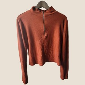 Orange half zip long sleeve